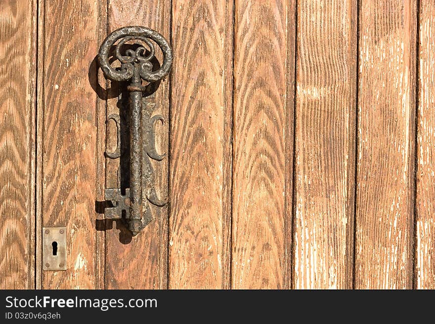 The old door handle in the form of key