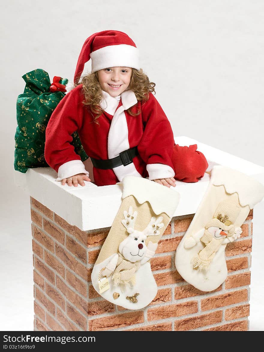 Portrait of Christmas baby in Santa hat
