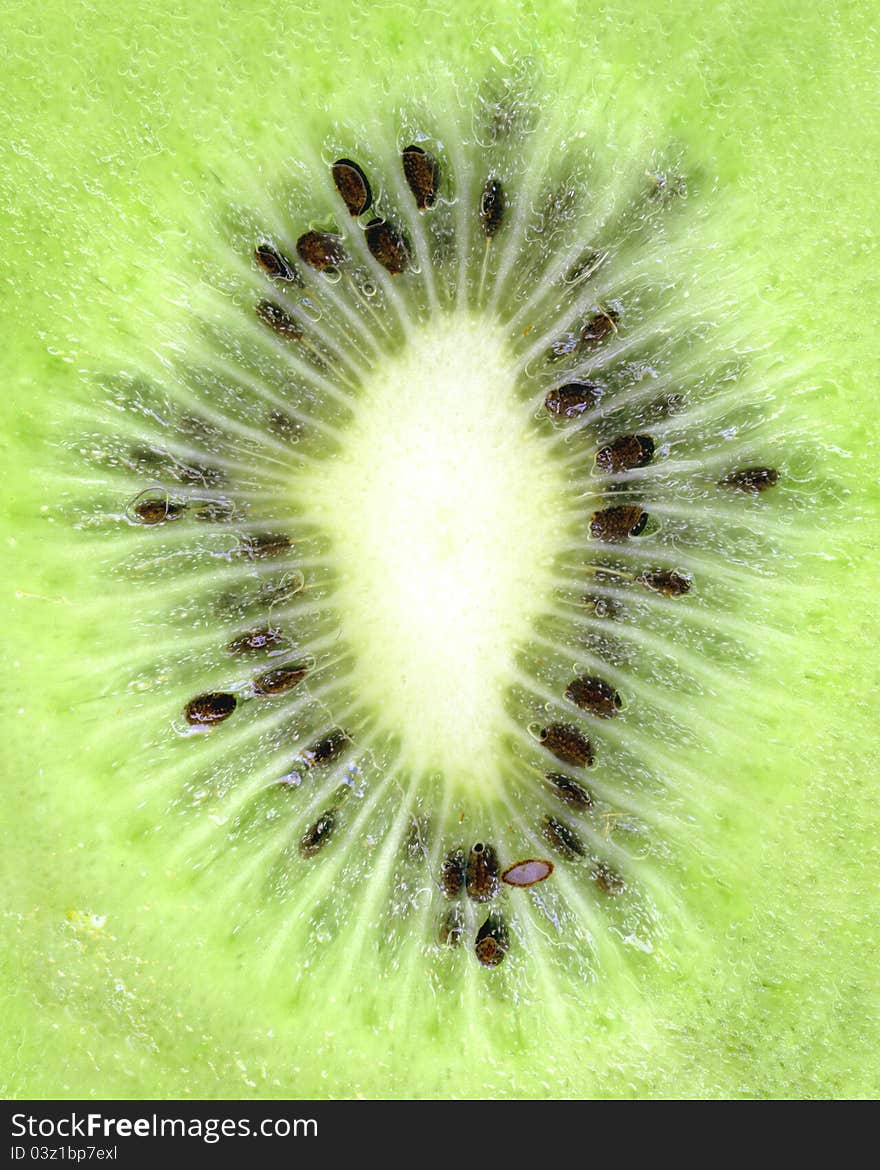 Kiwi texture, close-up, fruit cut in half