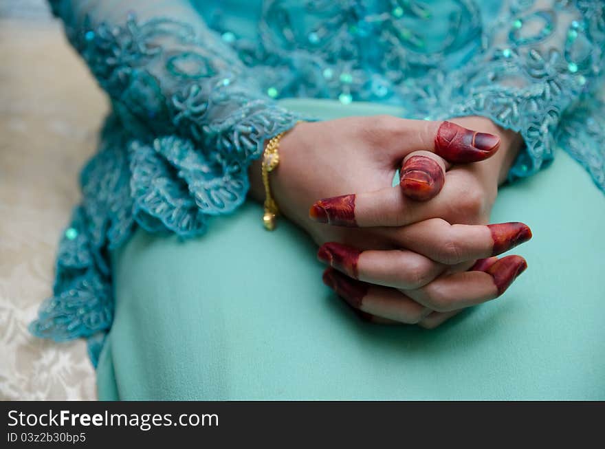 Bride's hand wearing henna