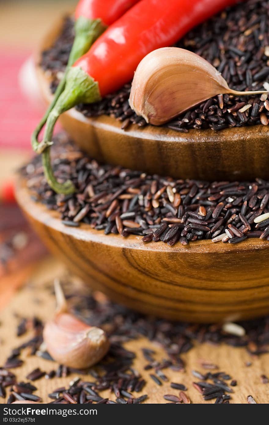 Brown rice in wooden bowls. Brown rice in wooden bowls