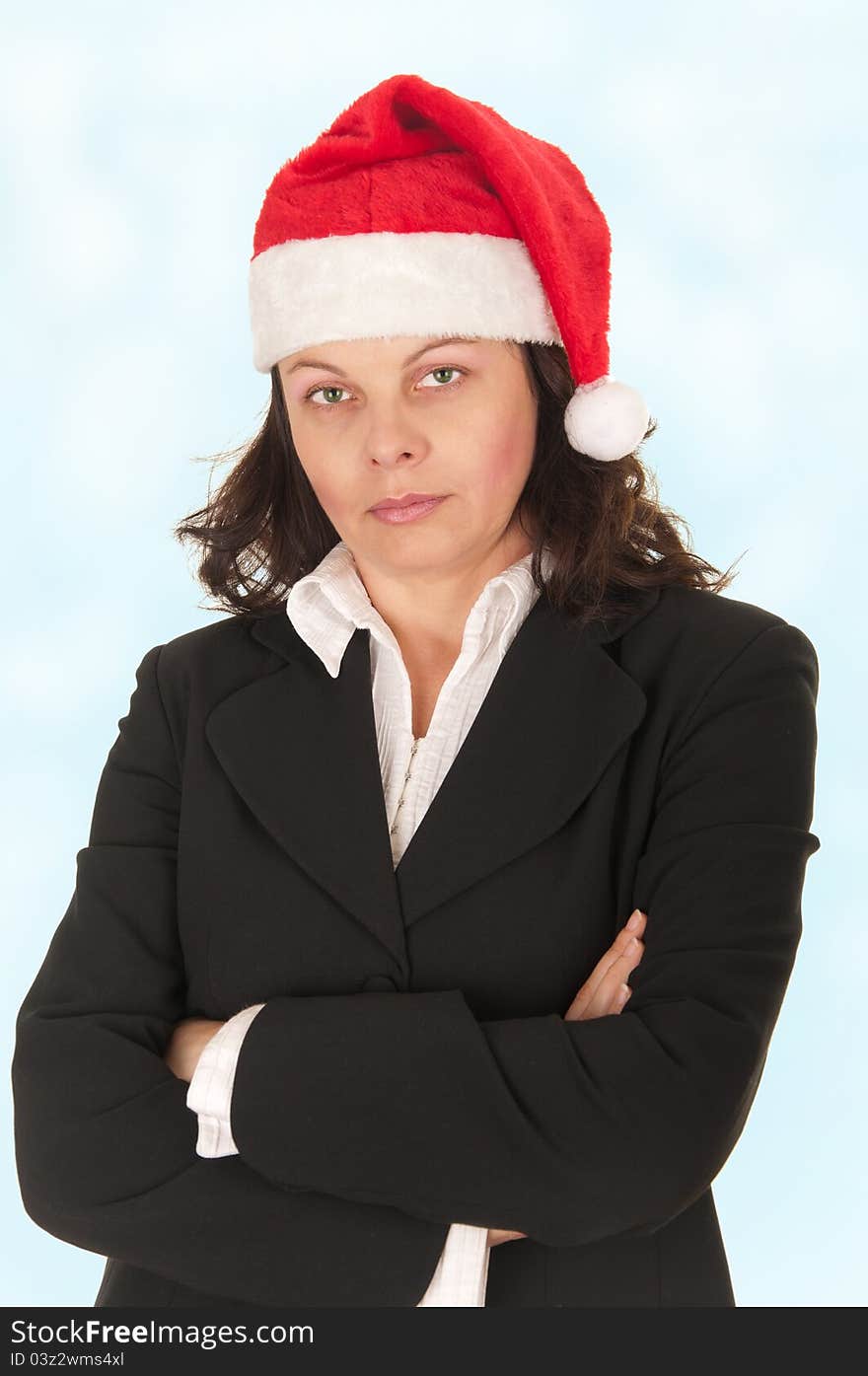 Business woman with a hat of Santa Claus