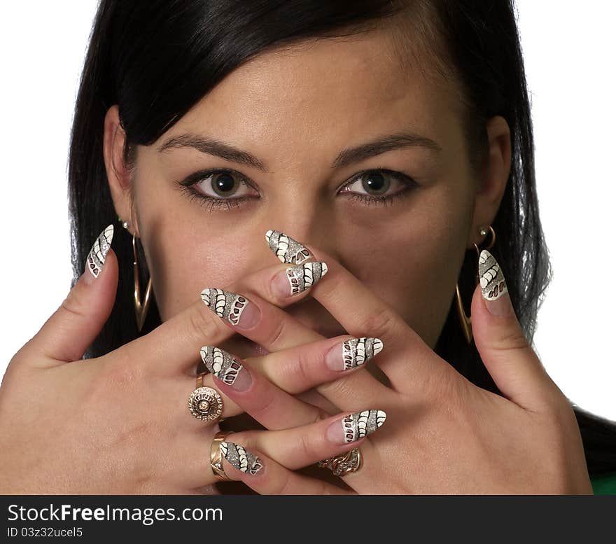 Portrait of the beautiful girl showing manicure