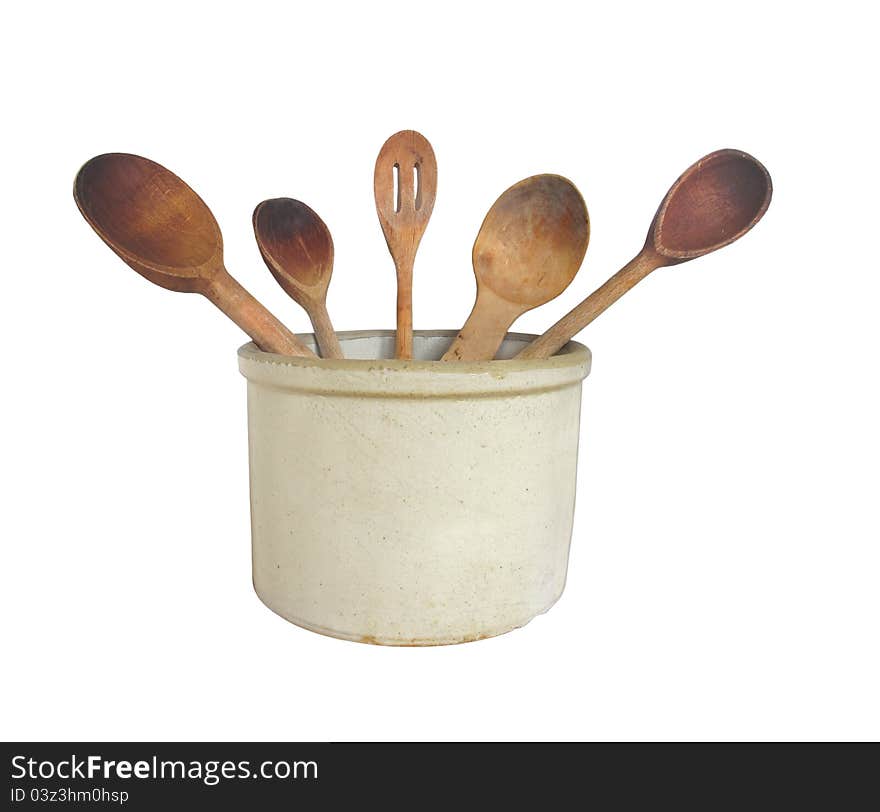 Vintage Crock With Wooden Spoons Isolated.