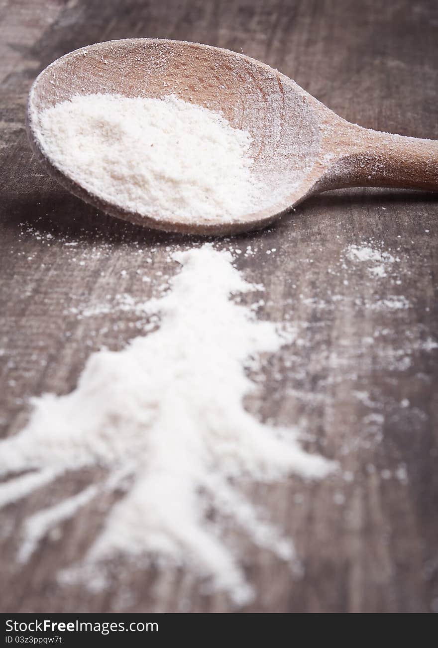 Flour in a wooden spoon