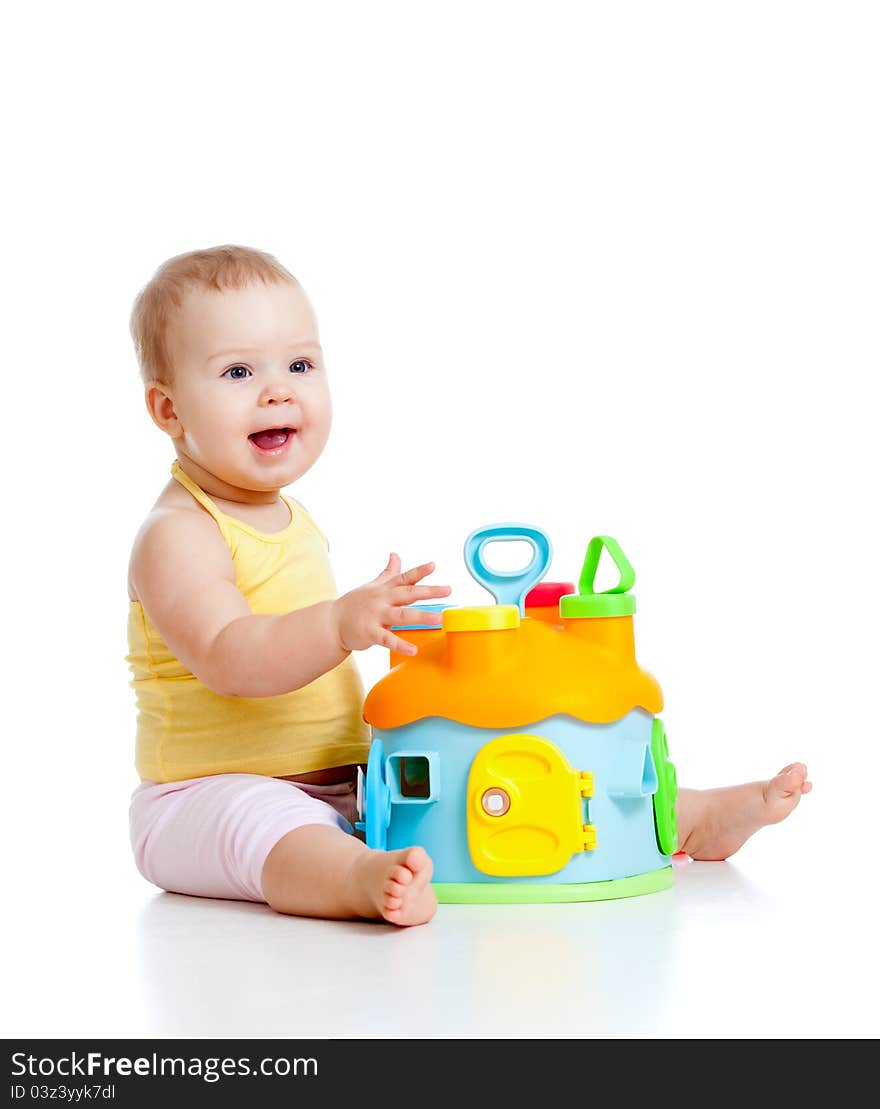 Cheerful baby girl with color educational toy. Cheerful baby girl with color educational toy