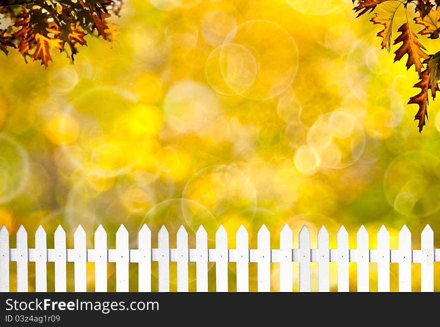 White fence. Autumn bokeh, abstract background