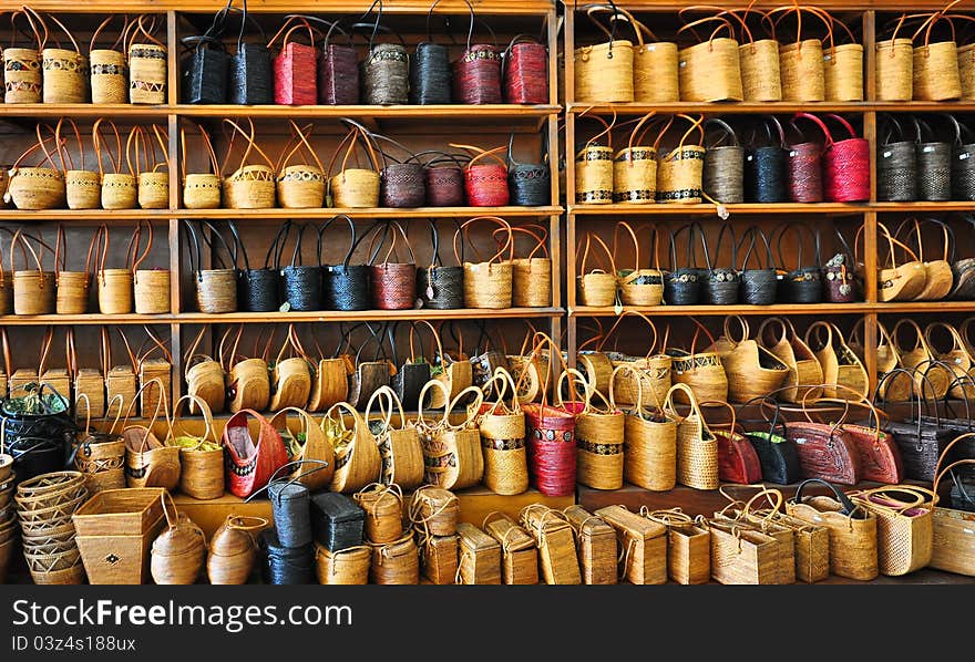 Store shelf with hand bags