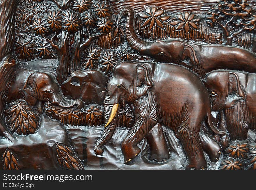 Elephant in the forest thai style art wood carving background texture