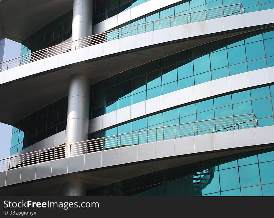 Modern architectural facade with blue glass panes. Modern architectural facade with blue glass panes