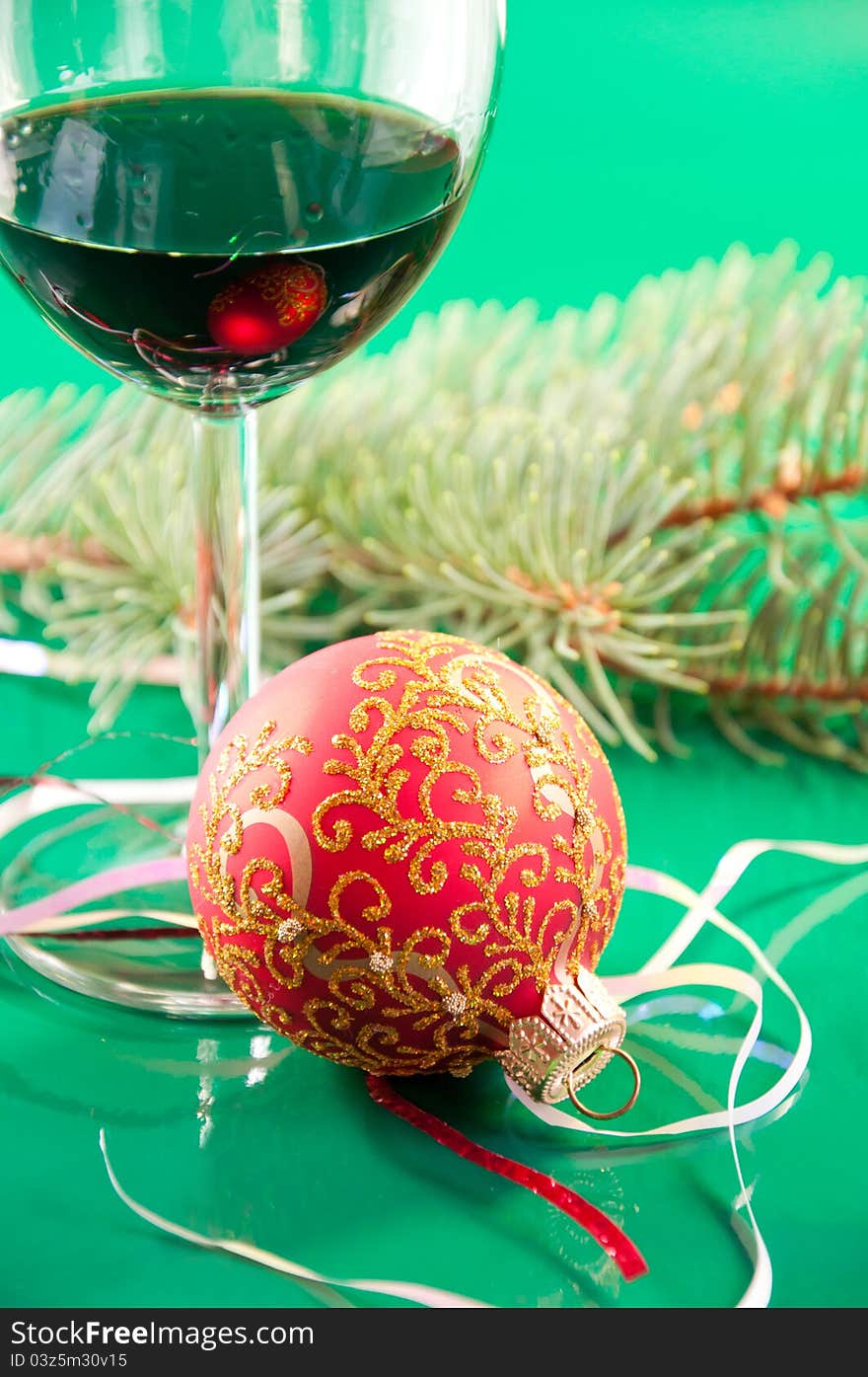 New Year's still life - glasses of wine and Christmas balls