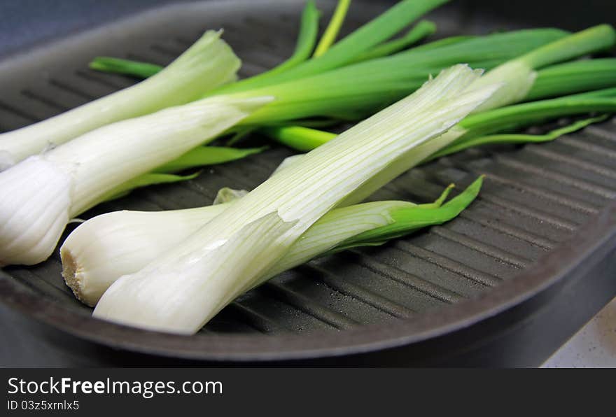 Grilled spring onion