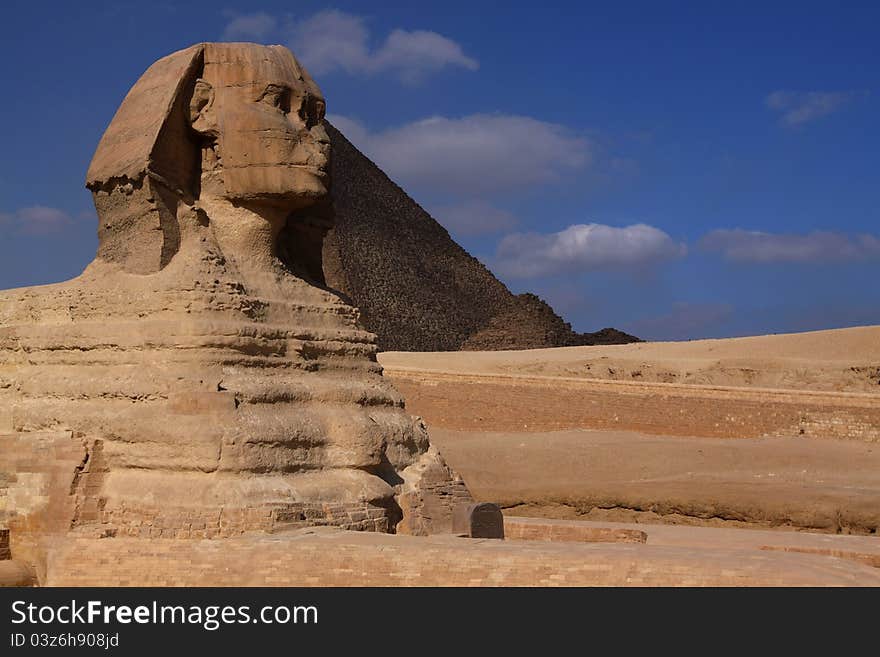 This is ancient sculpture near one of the Giza Pyramids. This is ancient sculpture near one of the Giza Pyramids