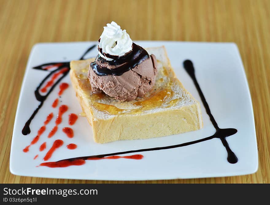 Honey toast  and whipping cream with chocolate ice cream. Honey toast  and whipping cream with chocolate ice cream