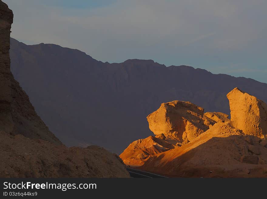 High road in desert with sun light stones, Egypt. High road in desert with sun light stones, Egypt