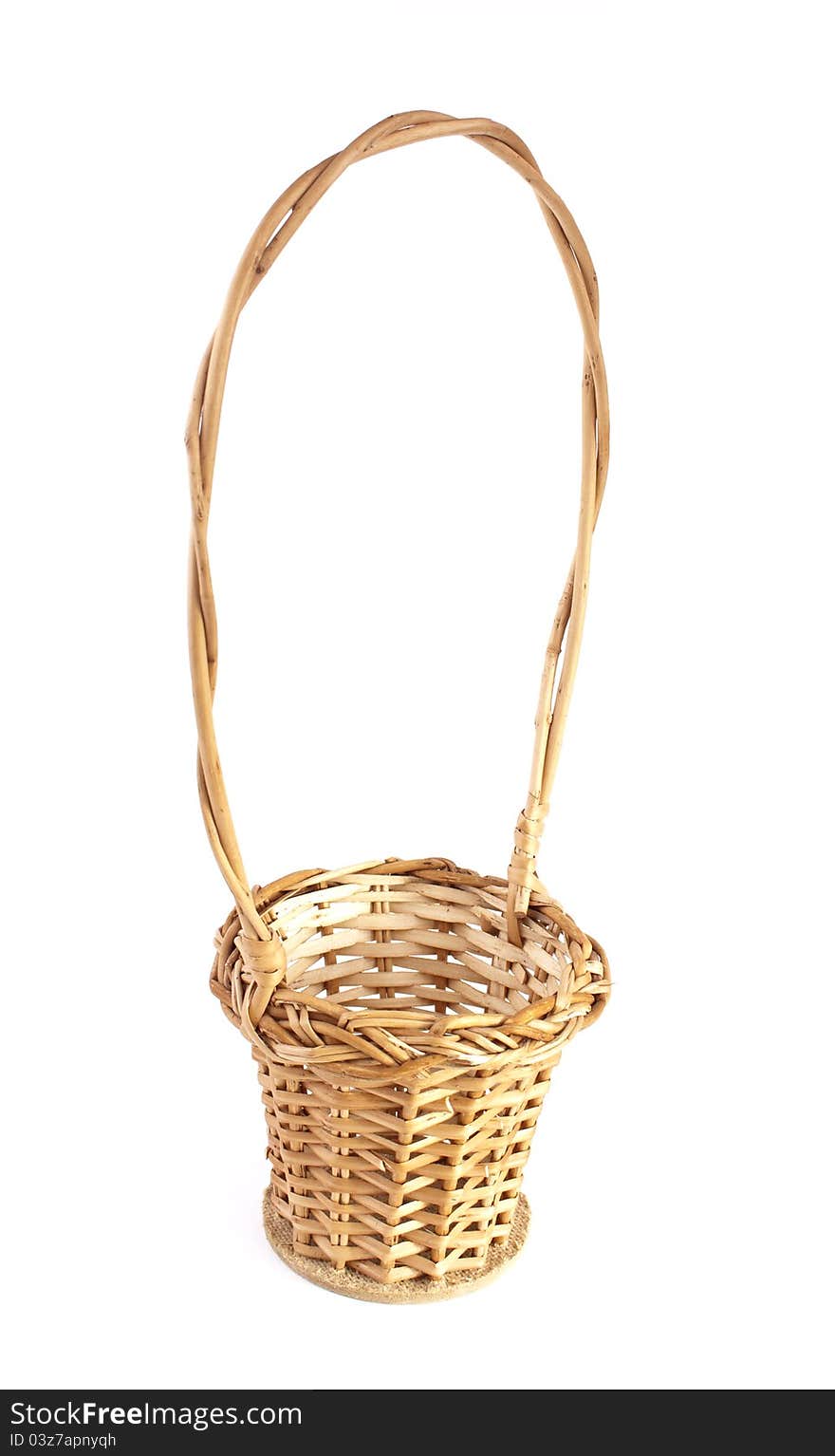 Empty brown wicker basket isolated on white