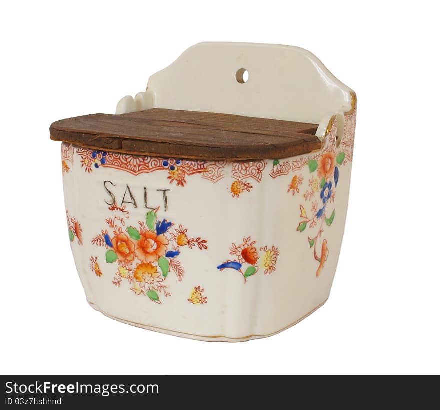 Vintage porcelain decorated salt container with lid. Isolated on white. Vintage porcelain decorated salt container with lid. Isolated on white.