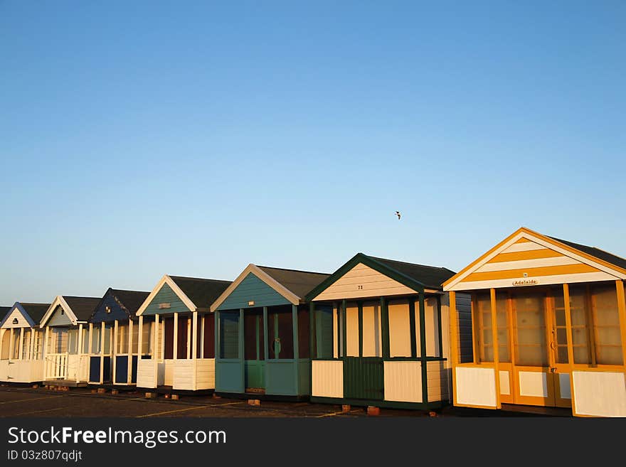 Beach Huts In Golden Sunlight