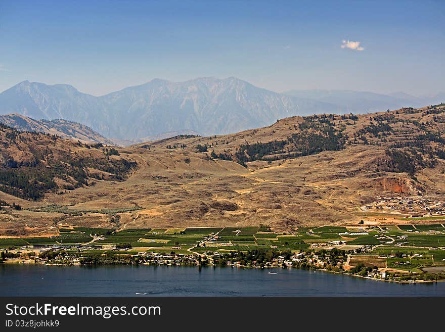 When I am travelling through Osoyoos I am always struck by the contrast of desert and the lush farmland on the banks of Osoyoos Lake. The winds have blown a smokey haze over the town from a nearby forest fire.