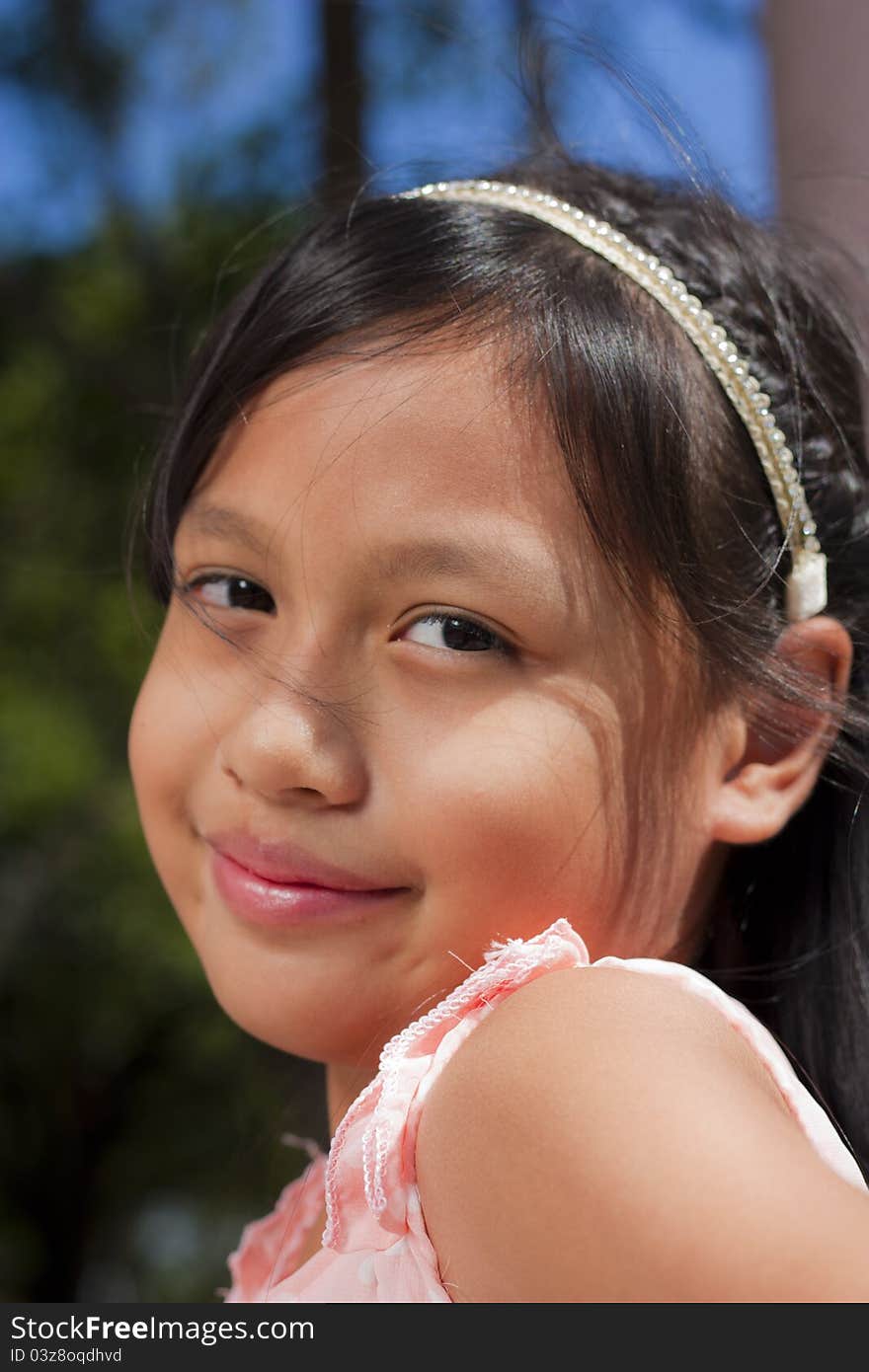 Little asian girl smile with shallow focus. Little asian girl smile with shallow focus