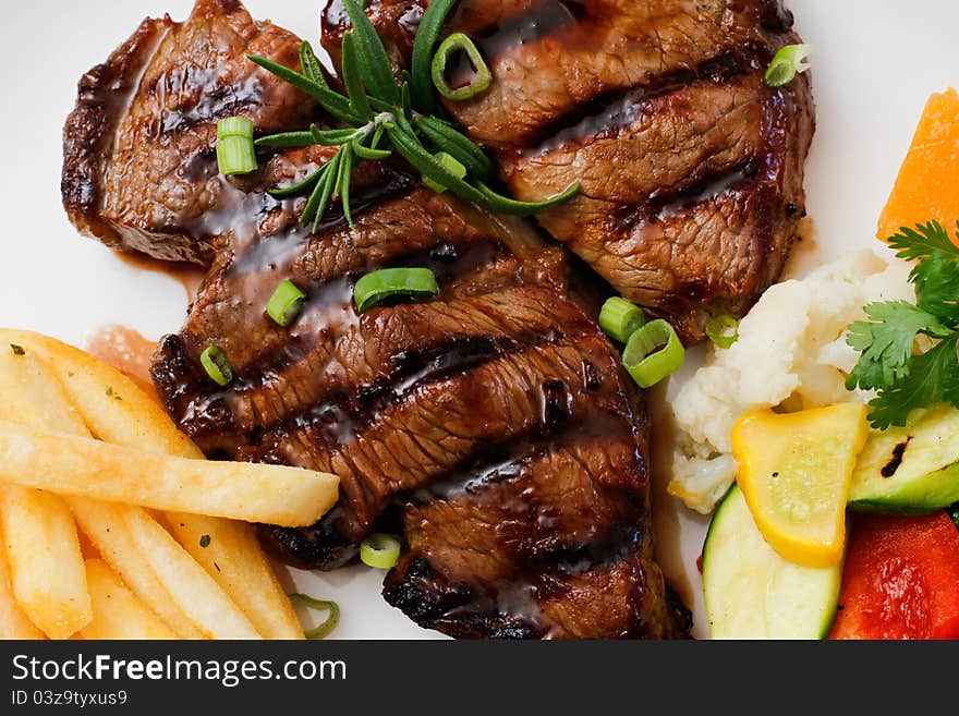 Grilled steak and vegetables