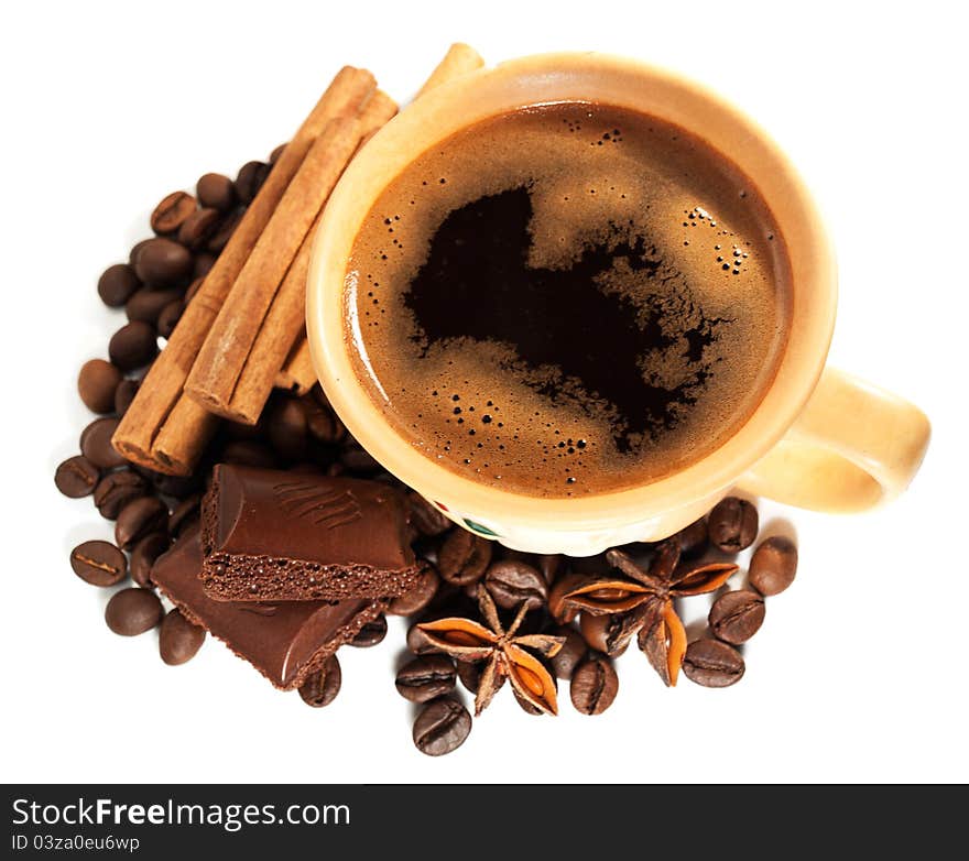 Cup of coffee with spice on a white background