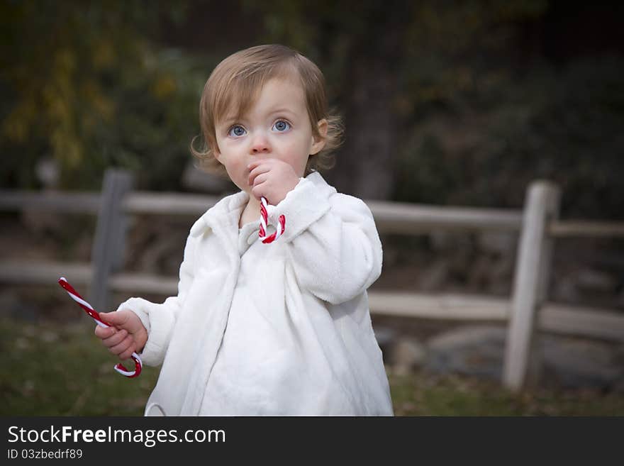 Adorable Baby Girl Playing in Park