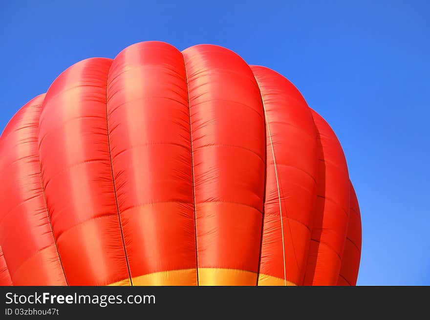 Hot air balloon against blue sky background