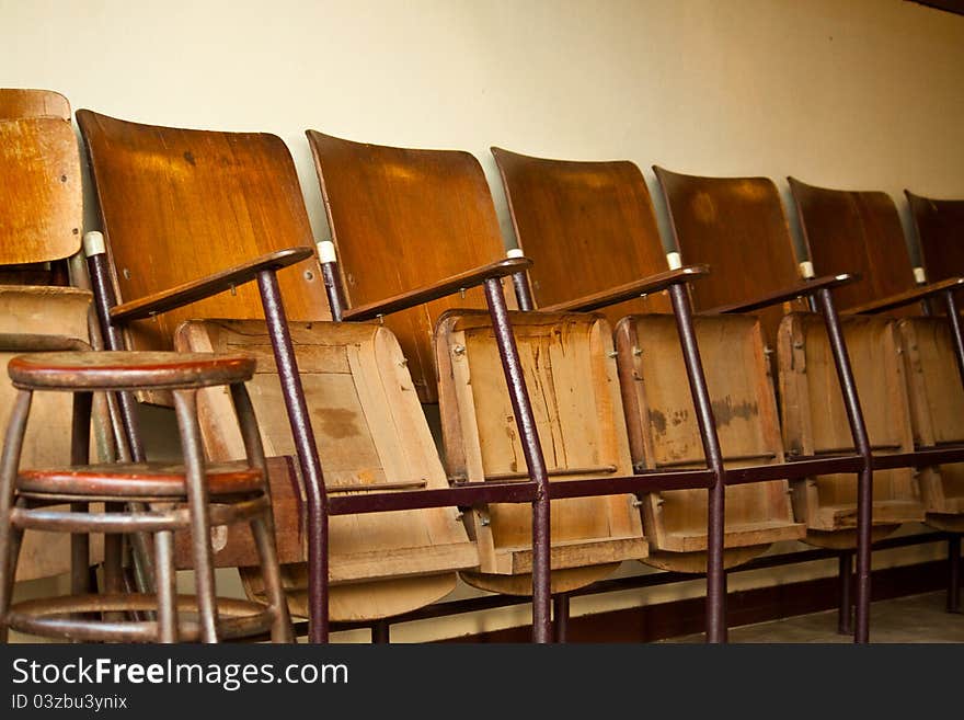 A many chair in old theather. A many chair in old theather