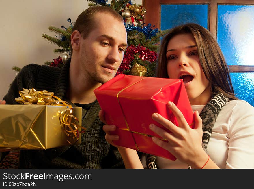 Young couple enjoying gifts