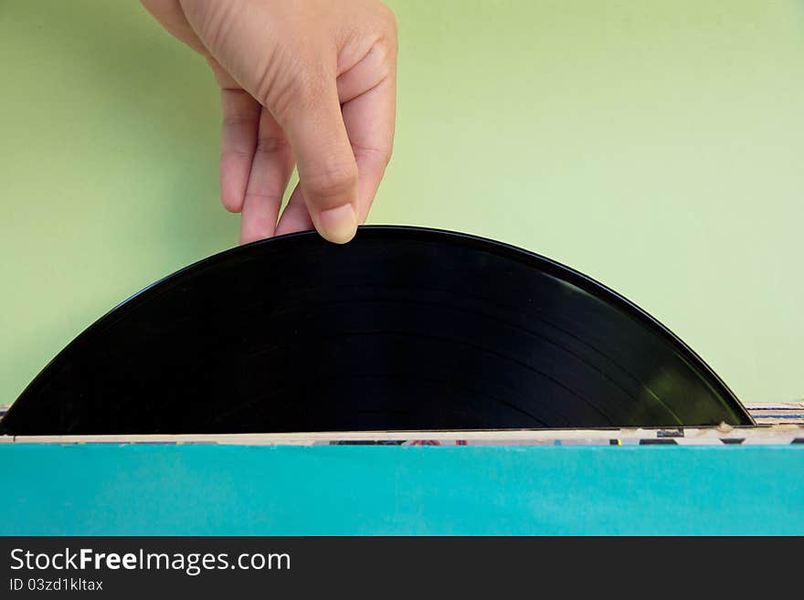 Image of Hand Holding A Record