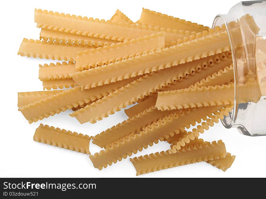 Dried pasta in a glass jar on white background. Dried pasta in a glass jar on white background