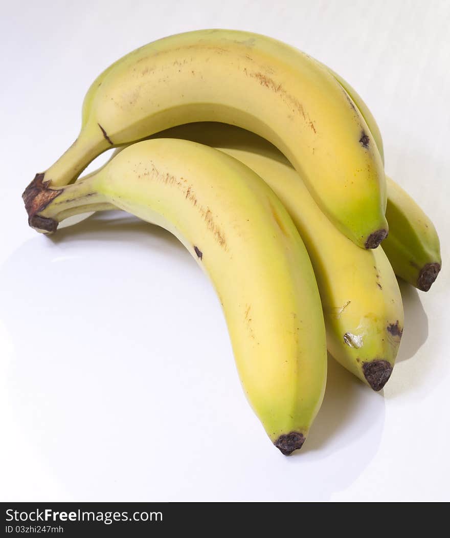 Canary bananas fresh white background