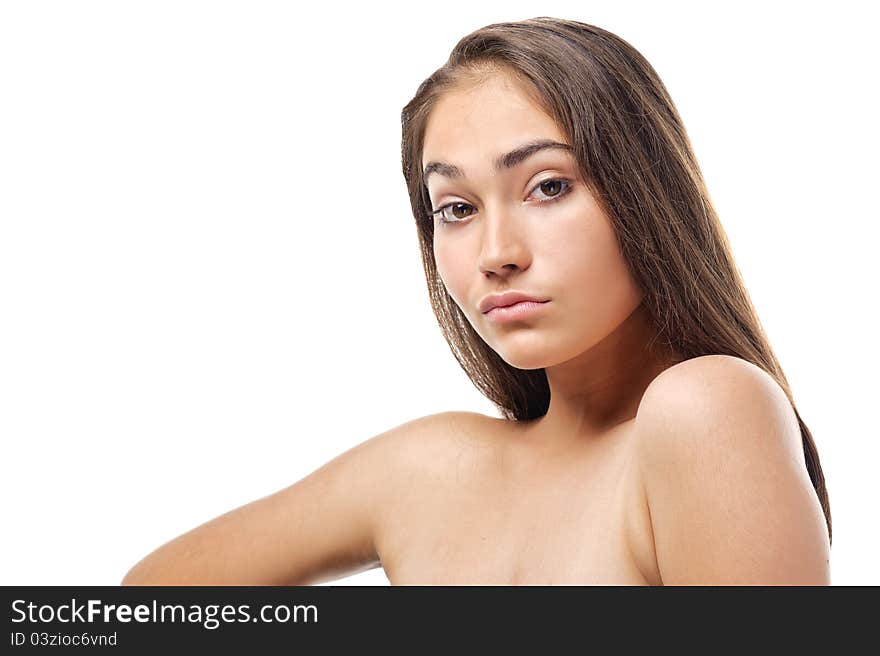 Portrait of beautiful young woman. Isolated over white