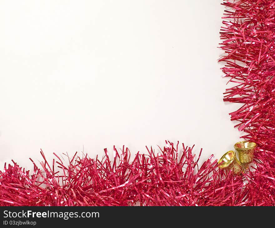 Golden christmas bells and red decoration on white background. Golden christmas bells and red decoration on white background.