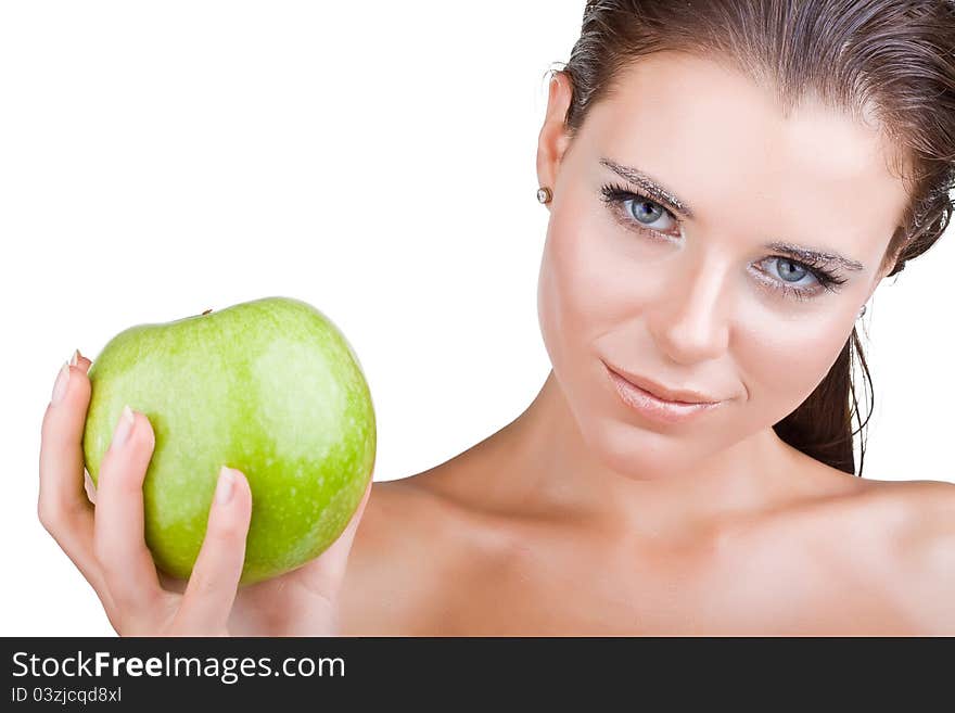 Beautiful girl holds in a hand green apple, isolated on white background. Beautiful girl holds in a hand green apple, isolated on white background