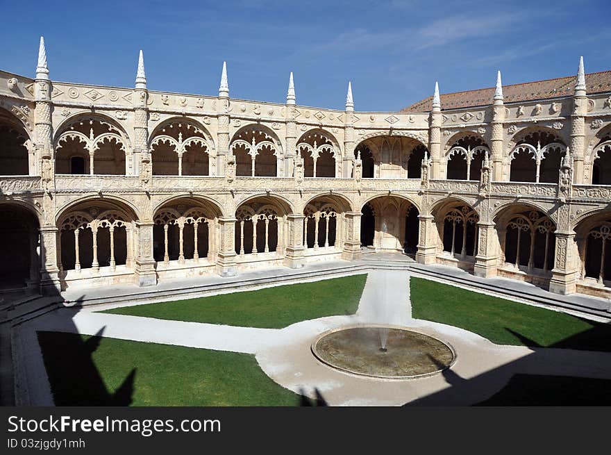 The cloistered courtyard at jeronimos monastery in lisbon portugal. The cloistered courtyard at jeronimos monastery in lisbon portugal