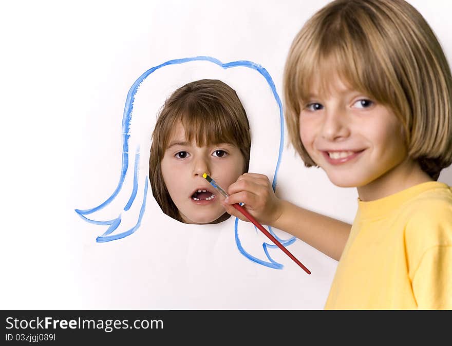 Child painting on the wall