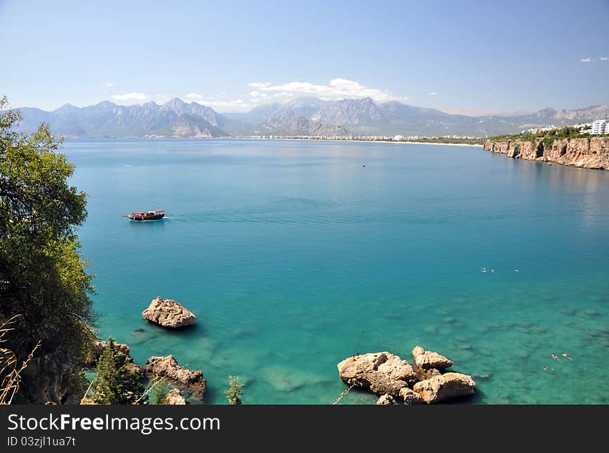 A small local boat taking daytrippers across the bay at antalya in turkey