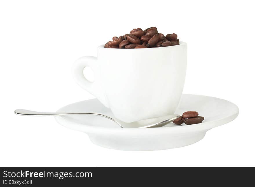 Pour coffee grounds into the cup is isolated on a white background