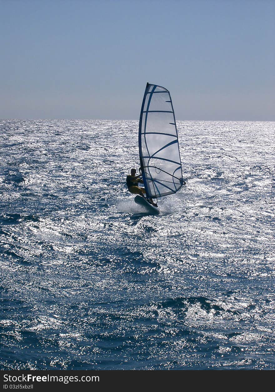 Windsurfing on the move - summer sport training. Windsurfing on the move - summer sport training