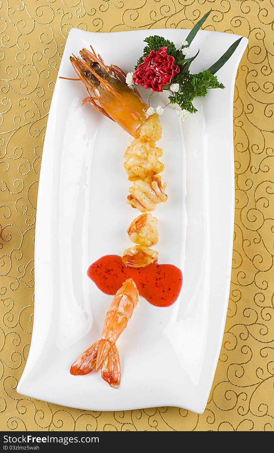 Gourmet food cheese on white plate prawns. Gourmet food cheese on white plate prawns