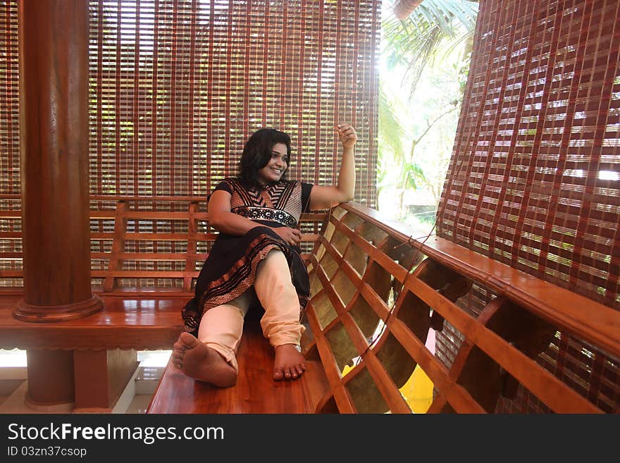 Beautiful Indian girl like watching nature from balcony. Beautiful Indian girl like watching nature from balcony