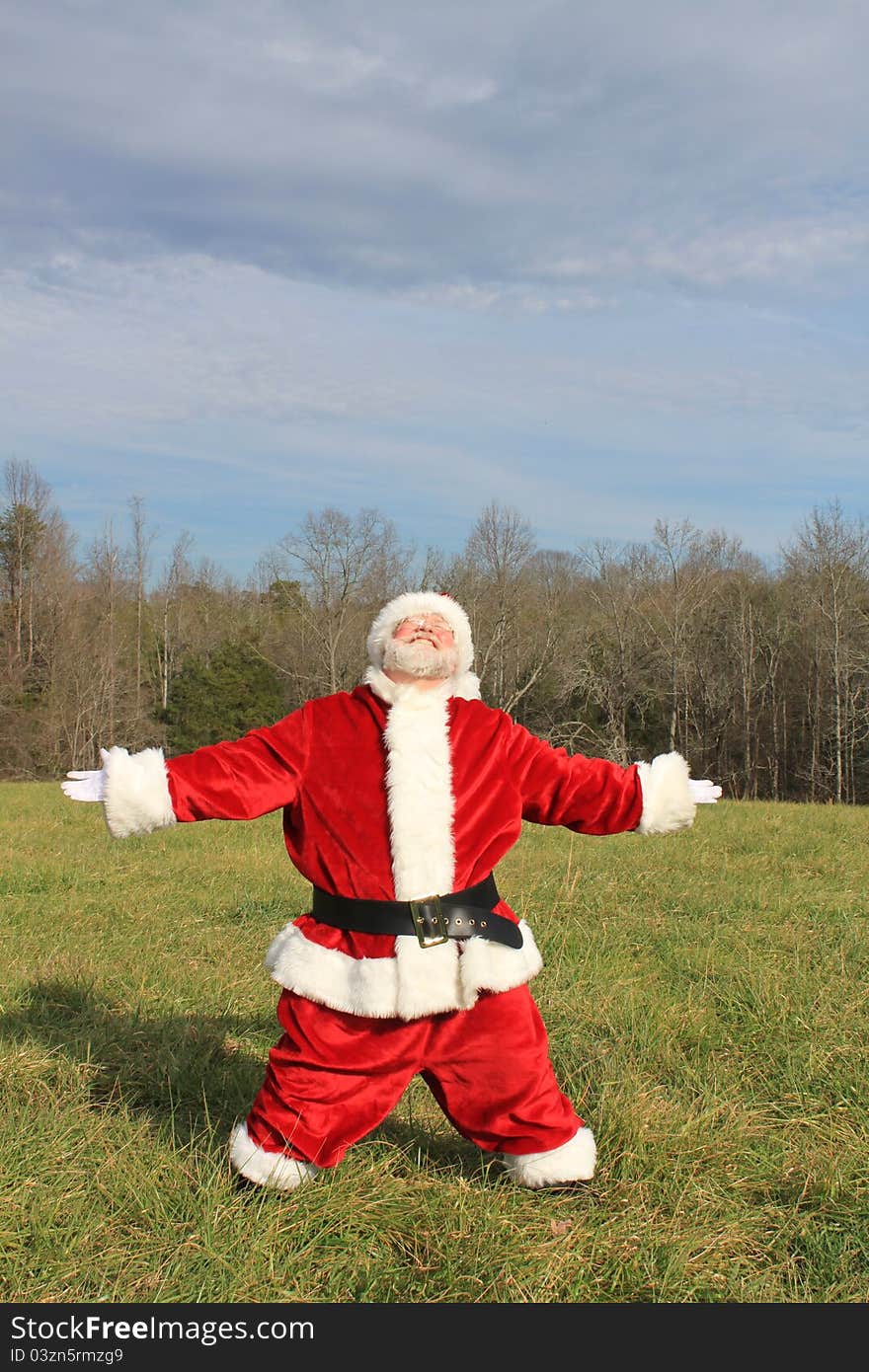 Santa Claus with arms and legs spread in an attitude of sheer joy. Santa Claus with arms and legs spread in an attitude of sheer joy.