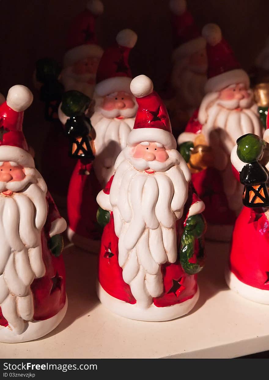 Santa Claus figurines for sale in a shop to Christmas