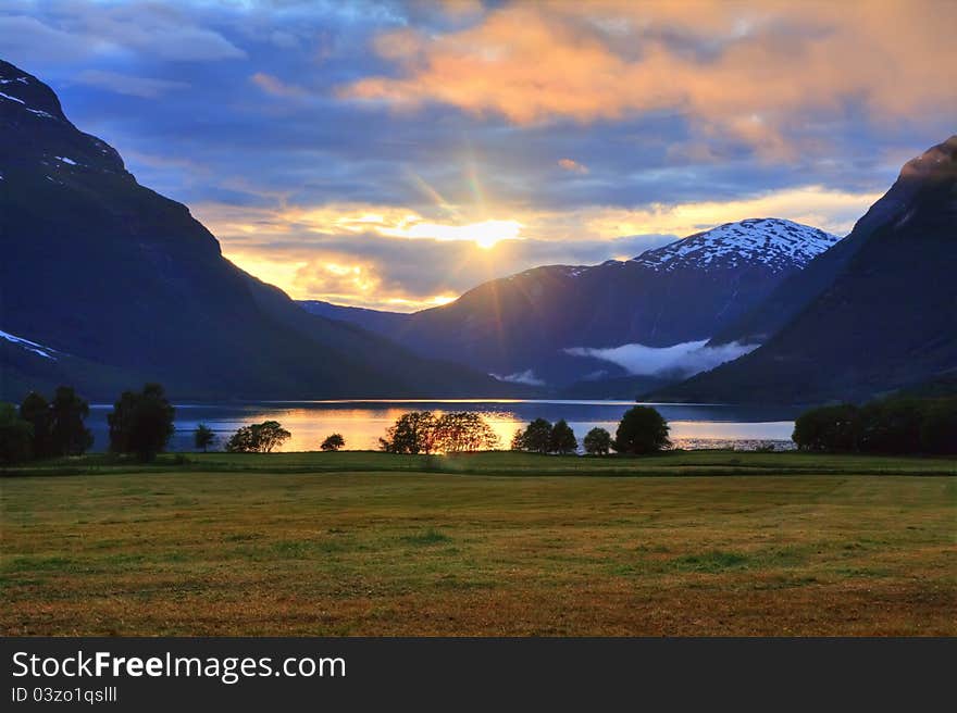 Beauyiful summer sunset near lake Lovatnet in Jostedalsbreen national park, Norway. Beauyiful summer sunset near lake Lovatnet in Jostedalsbreen national park, Norway