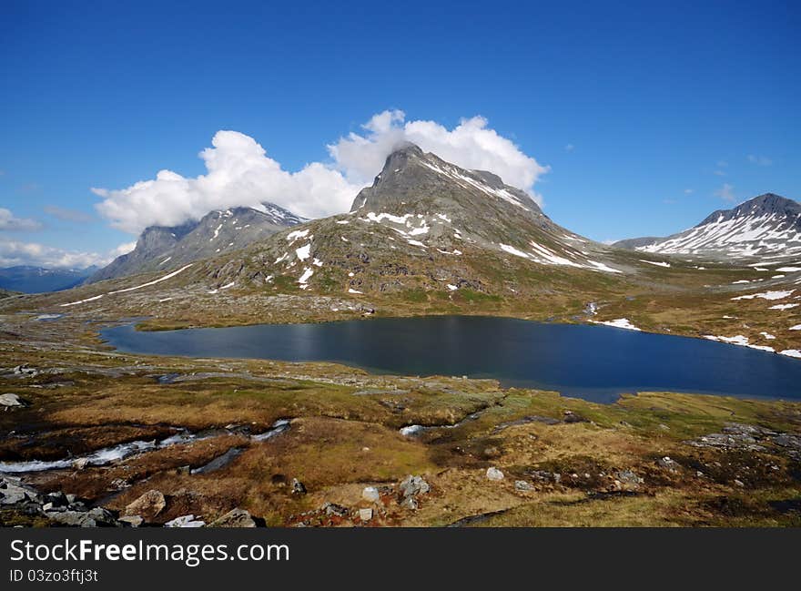 Beautiful mountain lake in Norway near Troll road