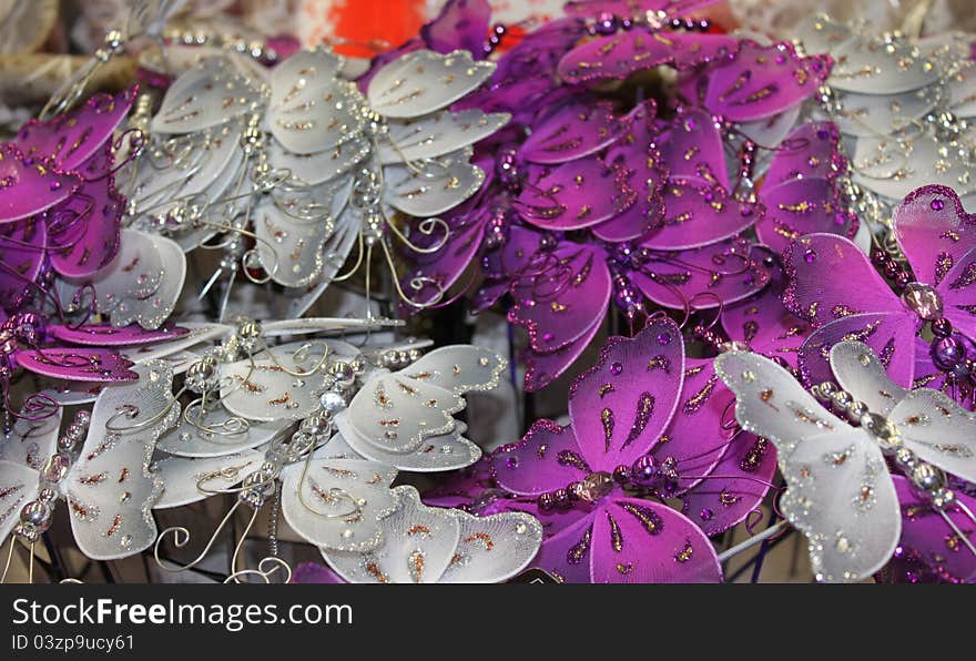 Decorative butterflies colored pink and silver