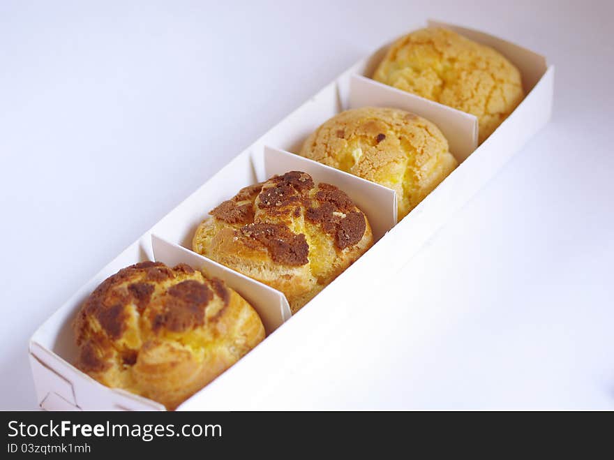 Four baked bread in a box