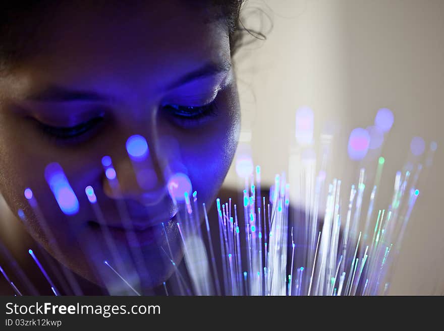 Beautiful indian female in blue  light glow. Beautiful indian female in blue  light glow